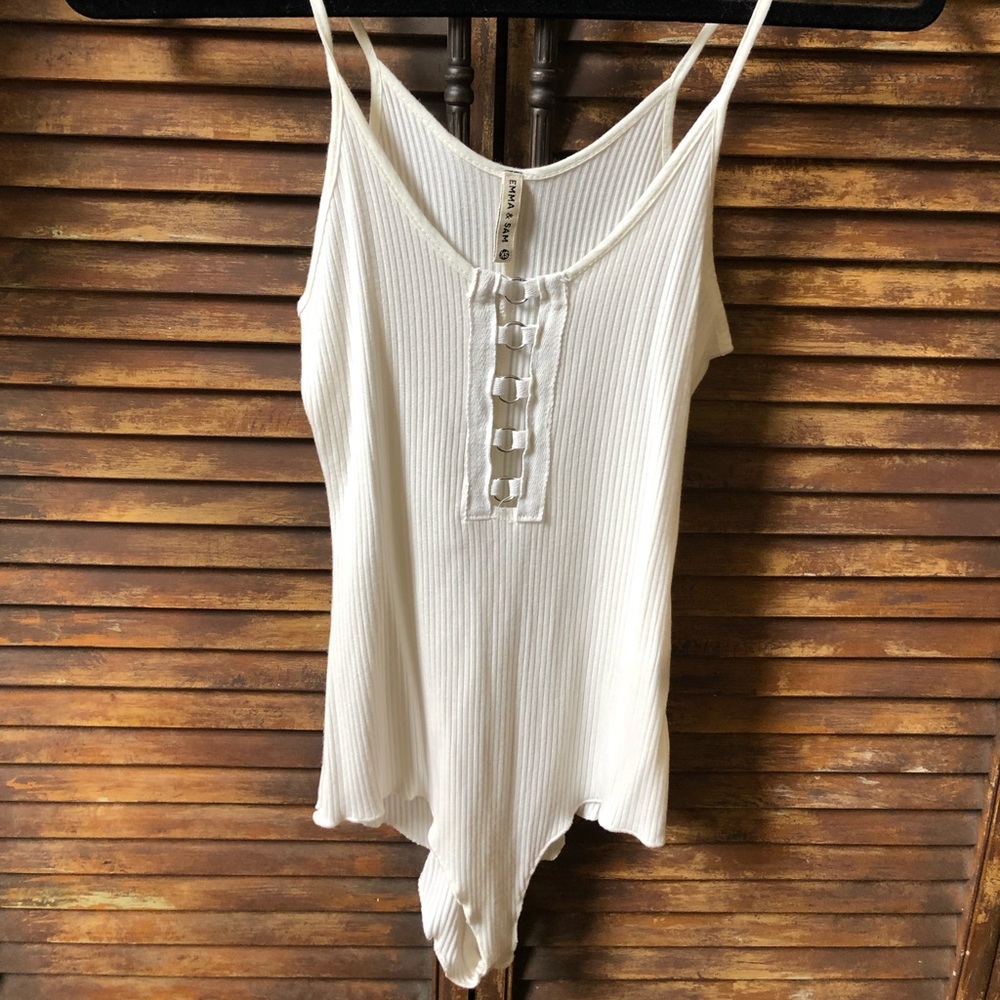 White onesie with metal detailing